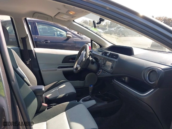 2014 Toyota Prius c One with VIN JTDKDTB37E1571685, listed as a IAAI auction lot 41967732 with 1 mi miles. Bid and sale history available at carsss.com. Image 5.