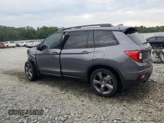 2021 Honda Passport Touring z VIN 5FNYF7H94MB005741, wystawiony jako Copart lot #57626664 z przebiegiem Nie podano mil oraz Szkoda całkowita • Salvage title. Historia ofert i sprzedaży dostępna na DreamBid. Obrazek 2.