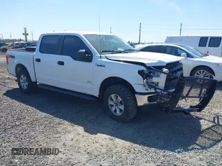 2015 Ford F-150 XLT with VIN 1FTEW1EPXFKE20880, listed as a IAAI auction lot 42034493 with 152,588 mi miles and . Bid and sale history available at DreamBid. Image 1.