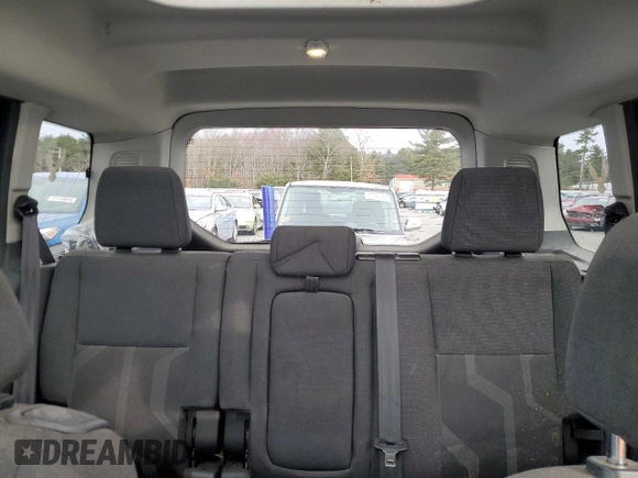 2015 Ford Transit Connect XLT with VIN NM0AE8F77F1202312, listed as a Copart auction lot 87724125 with 100,463 mi miles and Salvage title. Bid and sale history available at DreamBid. Image 10.