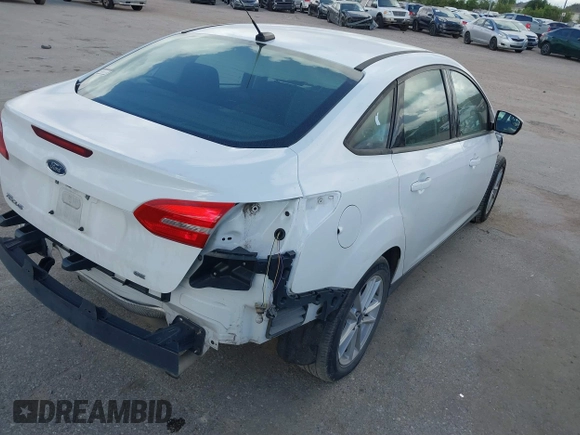 2017 Ford Focus SE with VIN 1FADP3F28HL285649, listed as a IAAI auction lot 39718289 with 118,366 mi miles and . Bid and sale history available at DreamBid. Image 4.