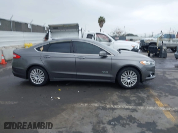 2013 Ford Fusion Titanium with VIN 3FA6P0SUXDR332271, listed as a IAAI auction lot 42174434 with 201,404 mi miles and . Bid and sale history available at DreamBid. Image 13.