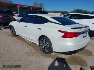 2017 Nissan Maxima Platinum with VIN 1N4AA6AP4HC412504, listed as a IAAI auction lot 41251614 with 150,007 mi miles. Bid and sale history available at carsss.com. Image 3.