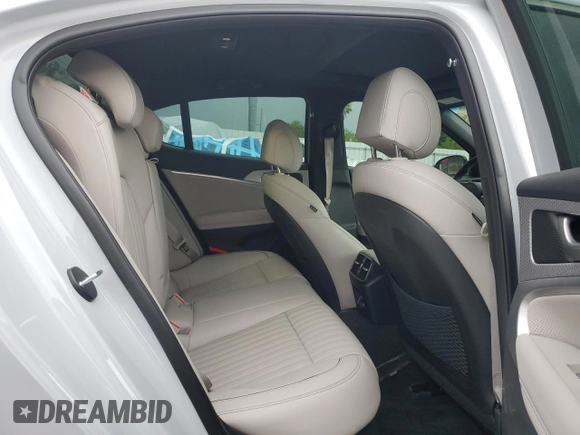 2023 Genesis G70 2.0T with VIN KMTG34TA3PU114905, listed as a Copart auction lot 61777435 with 26,493 mi miles and Salvage title. Bid and sale history available at DreamBid. Image 10.