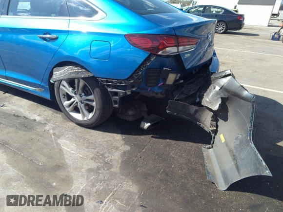 2018 Hyundai Sonata Sport with VIN 5NPE34AF4JH701183, listed as a IAAI auction lot 41901813 with 99,132 mi miles and . Bid and sale history available at carsss.com. Image 6.