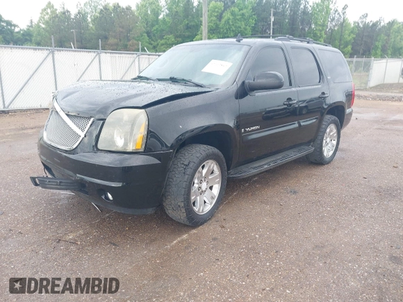 2008 GMC Yukon SLT 4SB z VIN 1GKFK13018J146391, wystawiony jako IAAI lot #42102852 z przebiegiem 305 880 mil mil oraz . Historia ofert i sprzedaży dostępna na DreamBid. Obrazek 2.