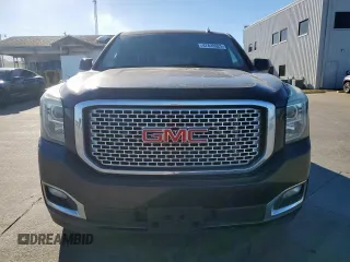 2015 GMC Yukon Denali with VIN 1GKS1CKJ7FR132677, listed as a Copart auction lot 47820925 with 144,821 mi miles and Salvage Title. Bid and sale history available at carsss.com. Image 5.