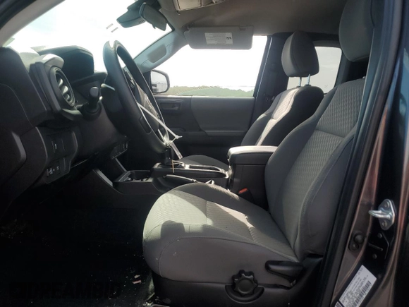 2023 Toyota Tacoma SR с VIN 3TYSX5EN7PT022093, выставлен на аукционе Copart как лот 56692825 с пробегом 17 055 миль миль и Списание • Salvage title. История ставок и продаж доступна на DreamBid. Изображение 7.