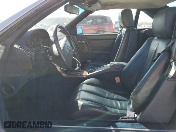 1991 MERCEDES-BENZ SL-CLASS SL with VIN WDBFA61E1MF022918, listed as a Copart auction lot 85011784 with 262,144 mi miles and Salvage Title. Bid and sale history available at DreamBid. Image 7.