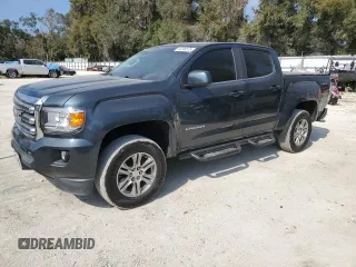 2019 GMC Canyon 4WD SLE with VIN 1GTG6CEN1K1129624, listed as a Copart auction lot 44106575 with 106,734 mi miles and Salvage Title. Bid and sale history available at carsss.com. Image 1.