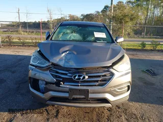 2018 Hyundai Santa Fe 2.4L z VIN 5NMZTDLB8JH098926, wystawiony jako IAAI lot #41816513 z przebiegiem 92 920 mil mil oraz . Historia ofert i sprzedaży dostępna na DreamBid. Obrazek 13.