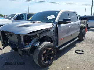 2022 Ram 1500 Rebel z VIN 1C6SRFLT2NN351050, wystawiony jako IAAI lot #41976882 z przebiegiem 59 490 mil mil oraz . Historia ofert i sprzedaży dostępna na DreamBid. Obrazek 18.