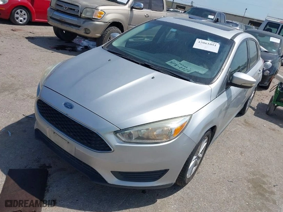 2016 Ford Focus SE with VIN 1FADP3K29GL269691, listed as a IAAI auction lot 42061051 with 100,692 mi miles. Bid and sale history available at carsss.com. Image 2.