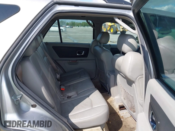2004 Cadillac SRX with VIN 1GYDE63A740111607, listed as a IAAI auction lot 41918519 with 239,042 mi miles. Bid and sale history available at carsss.com. Image 8.