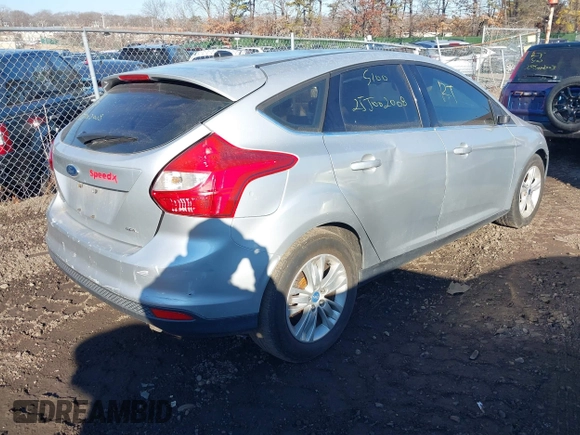 2012 Ford Focus SEL with VIN 1FAHP3M28CL162768, listed as a IAAI auction lot 41682973 with 999,999 mi miles. Bid and sale history available at carsss.com. Image 4.