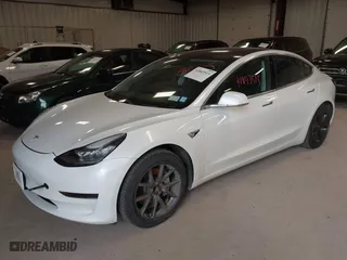 2020 Tesla Model 3 Standard Range Plus with VIN 5YJ3E1EA4LF802207, listed as a IAAI auction lot 41843515 with 67,156 mi miles. Bid and sale history available at carsss.com. Image 20.