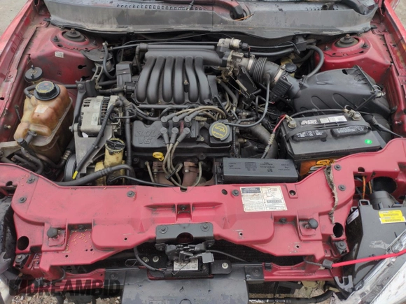 2001 Ford Taurus LX with VIN 1FAFP52UX1A176008, listed as a Copart auction lot 58983935 with 123,985 mi miles and Salvage title. Bid and sale history available at DreamBid. Image 11.
