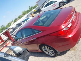 2013 Hyundai Sonata Limited z VIN 5NPEC4AC6DH683053, wystawiony jako IAAI lot #42355169 z przebiegiem 96 546 mil mil oraz . Historia ofert i sprzedaży dostępna na DreamBid. Obrazek 14.