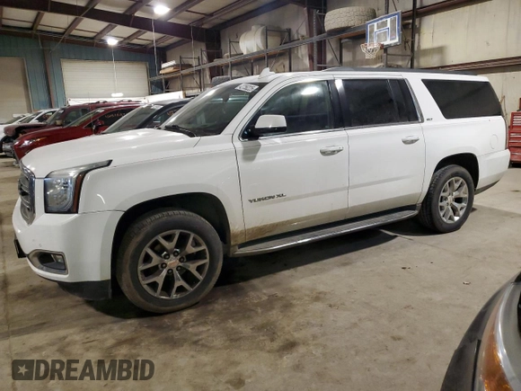 2015 GMC Yukon XL SLT with VIN 1GKS2HKC1FR541866, listed as a Copart auction lot 42756225 with 166,915 mi miles and Salvage Title. Bid and sale history available at carsss.com. Image 1.