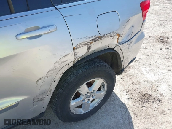 2011 Jeep Grand Cherokee Laredo z VIN 1J4RR4GG3BC589578, wystawiony jako IAAI lot #41804883 z przebiegiem 113 016 mil mil oraz . Historia ofert i sprzedaży dostępna na DreamBid. Obrazek 6.