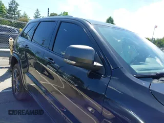 2021 Jeep Grand Cherokee Limited z VIN 1C4RJFBG4MC666557, wystawiony jako IAAI lot #42311088 z przebiegiem 126 808 mil mil oraz . Historia ofert i sprzedaży dostępna na DreamBid. Obrazek 13.