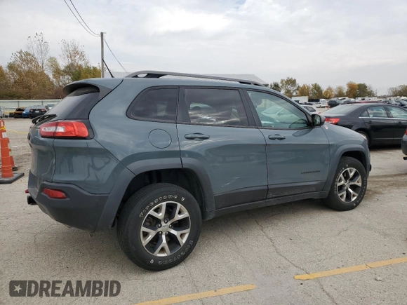 2015 Jeep Cherokee Trailhawk with VIN 1C4PJMBS0FW578199, listed as a Copart auction lot 77538544 with 122,444 mi miles and Salvage Title. Bid and sale history available at carsss.com. Image 3.