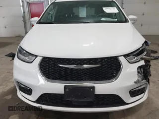2022 Chrysler Pacifica Touring L z VIN 2C4RC1BG3NR178111, wystawiony jako IAAI lot #41572149 z przebiegiem 54 919 mil mil oraz . Historia ofert i sprzedaży dostępna na DreamBid. Obrazek 12.