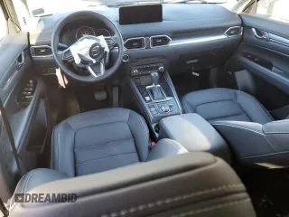 2025 Mazda CX-5 2.5 S Premium Plus Package with VIN JM3KFBEM7S0562230, listed as a Copart auction lot 47517835 with 0 mi miles and Salvage Title. Bid and sale history available at carsss.com. Image 8.