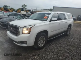 2020 GMC Yukon XL SLT with VIN 1GKS1GKC7LR292465, listed as a Copart auction lot 61487784 with 106,103 mi miles and Salvage Title. Bid and sale history available at carsss.com. Image 1.