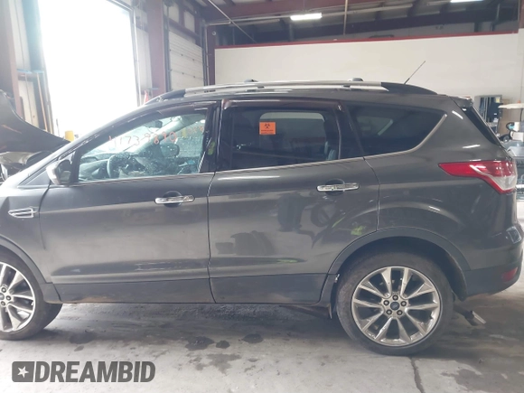 2016 Ford Escape SE with VIN 1FMCU9G93GUA33373, listed as a IAAI auction lot 41739890 with Not Provided miles and . Bid and sale history available at DreamBid. Image 14.