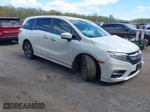 2018 Honda Odyssey Touring with VIN 5FNRL6H81JB023530, listed as a IAAI auction lot 42040124 with 109,128 mi miles and . Bid and sale history available at DreamBid. Image 1.