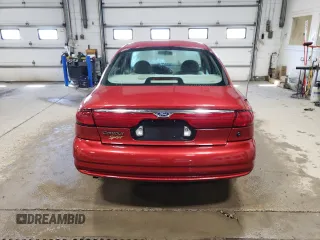 1998 Ford Contour z VIN 3FAFP66LXWM119339, wystawiony jako Copart lot #55103505 z przebiegiem 72 032 mil mil oraz Tytuł czysty. Historia ofert i sprzedaży dostępna na DreamBid. Obrazek 6.