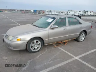 2002 Mazda 626 LX with VIN 1YVGF22DX25263864, listed as a IAAI auction lot 41846129 with 282,516 mi miles. Bid and sale history available at carsss.com. Image 2.
