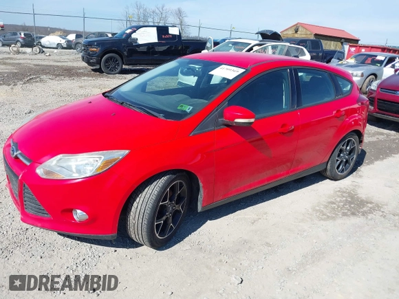 2013 Ford Focus SE with VIN 1FADP3K28DL180271, listed as a IAAI auction lot 41709369 with 121,823 mi miles. Bid and sale history available at carsss.com. Image 2.