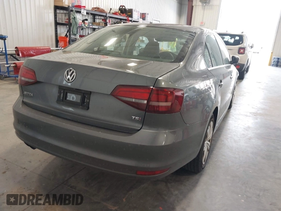 2017 Volkswagen Jetta S with VIN 3VW2B7AJ4HM357707, listed as a IAAI auction lot 42606933 with 124,253 mi miles and . Bid and sale history available at DreamBid. Image 4.
