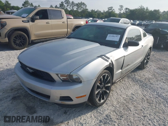2012 Ford Mustang Premium with VIN 1ZVBP8AM7C5288124, listed as a IAAI auction lot 42280797 with 188,223 mi miles and . Bid and sale history available at DreamBid. Image 2.