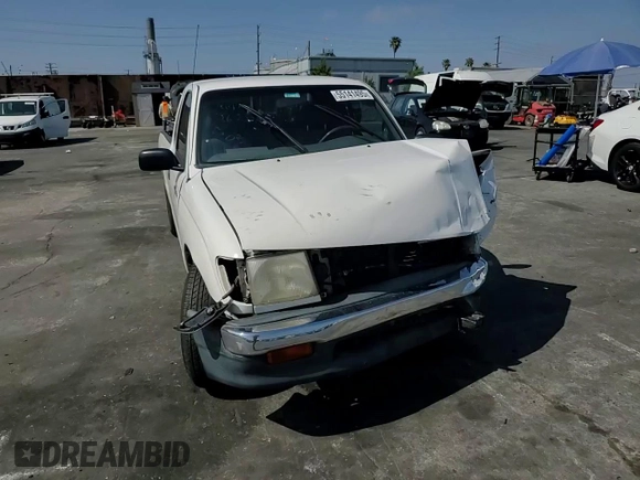 1999 Toyota Tacoma z VIN 4TAVL52N7XZ567598, wystawiony jako Copart lot #55141495 z przebiegiem 225 505 mil mil oraz Szkoda całkowita • Salvage title. Historia ofert i sprzedaży dostępna na DreamBid. Obrazek 13.