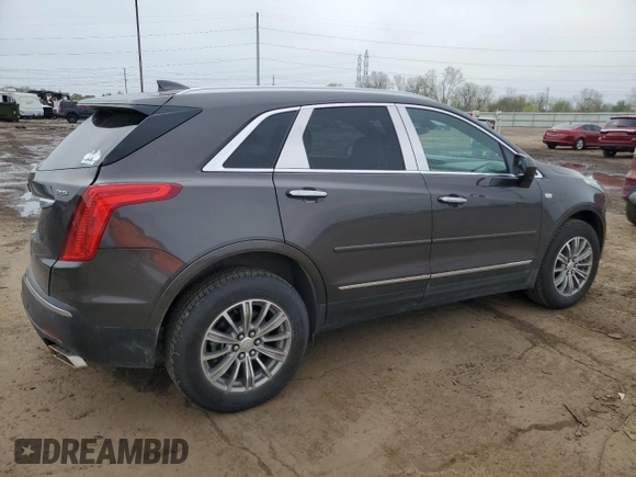 2019 Cadillac XT5 Luxury FWD with VIN 1GYKNCRSXKZ132871, listed as a Copart auction lot 54879405 with 57,325 mi miles and Salvage title. Bid and sale history available at DreamBid. Image 3.