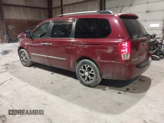 2014 Kia Sedona EX with VIN KNDMH4C74E6547870, listed as a IAAI auction lot 41403040 with 156,005 mi miles. Bid and sale history available at carsss.com. Image 3.