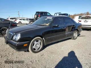 1997 Mercedes-Benz E-Class with VIN WDBJF72F0VA523161, listed as a Copart auction lot 77752804 with 143,495 mi miles and Salvage Title. Bid and sale history available at carsss.com. Image 1.