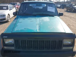1996 Jeep Cherokee Sport z VIN 1J4FJ68S2TL103997, wystawiony jako IAAI lot #41517835 z przebiegiem 175 560 mil mil oraz . Historia ofert i sprzedaży dostępna na DreamBid. Obrazek 10.