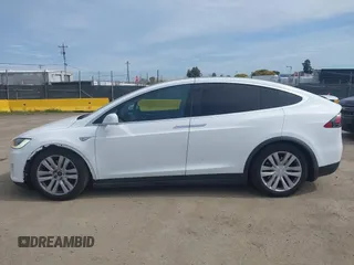 2016 Tesla Model X 70D with VIN 5YJXCBE24GF002020, listed as a IAAI auction lot 41799528 with 149,556 mi miles. Bid and sale history available at carsss.com. Image 14.