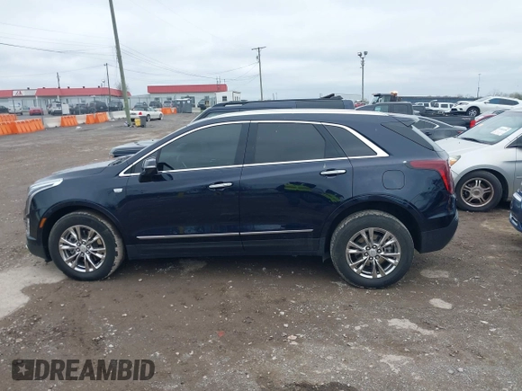 2021 Cadillac XT5 AWD Premium Luxury with VIN 1GYKNDRS6MZ147571, listed as a IAAI auction lot 41864286 with 46,144 mi miles. Bid and sale history available at carsss.com. Image 14.