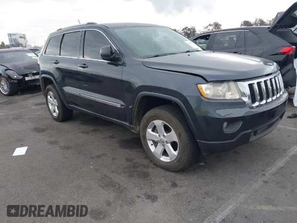 2013 Jeep Grand Cherokee Laredo with VIN 1C4RJEAGXDC620968, listed as a IAAI auction lot 41425270 with 127,739 mi miles. Bid and sale history available at carsss.com. Image 1.