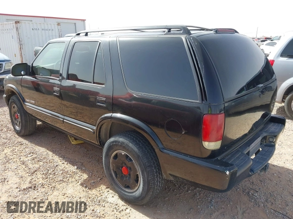 2002 Chevrolet Blazer LS z VIN 1GNDT13W42K124494, wystawiony jako IAAI lot #42266284 z przebiegiem 259 857 mil mil oraz . Historia ofert i sprzedaży dostępna na DreamBid. Obrazek 3.