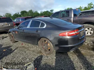 2014 Jaguar XF SC with VIN SAJWJ0EF0E8U31601, listed as a Copart auction lot 57146535 with 180,408 mi miles and Clean Title. Bid and sale history available at DreamBid. Image 2.