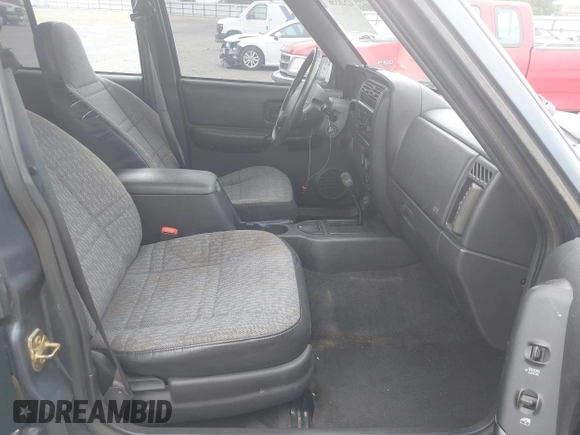 2001 Jeep Cherokee Sport with VIN 1J4FT48S61L594229, listed as a IAAI auction lot 42520336 with 190,862 mi miles and . Bid and sale history available at DreamBid. Image 5.