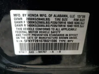 2007 Honda Pilot LX z VIN 5FNYF28107B021596, wystawiony jako Copart lot #51256235 z przebiegiem 176 391 mil mil oraz Czysty tytuł • Clean title. Historia ofert i sprzedaży dostępna na DreamBid. Obrazek 12.