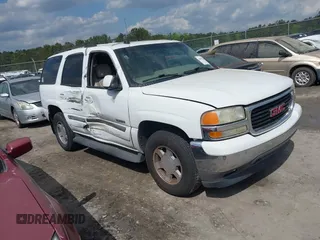 2005 GMC Yukon SLT z VIN 1GKEC13T75J209489, wystawiony jako IAAI lot #42005120 z przebiegiem 209 073 mil mil oraz . Historia ofert i sprzedaży dostępna na DreamBid. Obrazek 1.