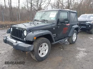 2017 Jeep Wrangler Sport z VIN 1C4GJWAG1HL502374, wystawiony jako IAAI lot #41938257 z przebiegiem 95 469 mil mil oraz . Historia ofert i sprzedaży dostępna na DreamBid. Obrazek 17.